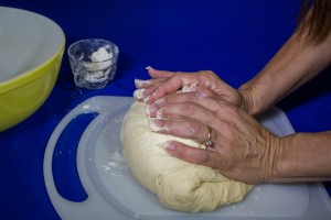 To knead=pull dough towards yourself and press down. Caution: Do not overwork your dough. 