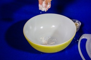 Sprinkle flour into a bowl. 